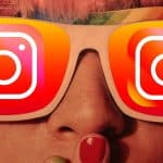 donna con occhiali icona Instagram espressione stupore per condividere Reels Instagram